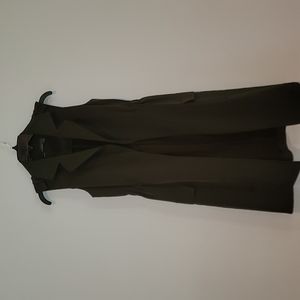 The limited sleeveless long vest